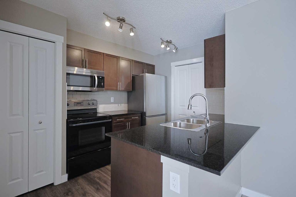 Photo of 10 Kincora Glen Park NW #305, Calgary, AB T3R 1K1 (MLS # A2343742)