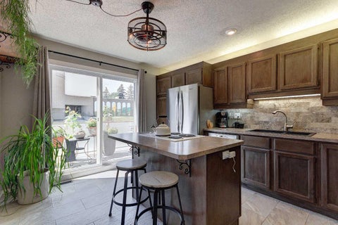 Photo of 1305 Glenmore Trail SW #103, Calgary, AB T2V 4Y8 (MLS # A2332170)