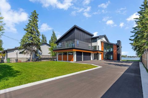 Photo of 476 WEST CHESTERMERE Drive, Chestermere, AB T1X 1B3 (MLS # A2278634)