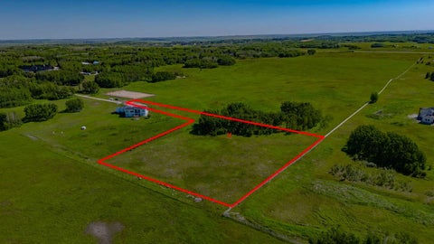 Photo of 32103 Badger Road, Rural Rocky View County, AB T4C 1A2 (MLS # A2324830)