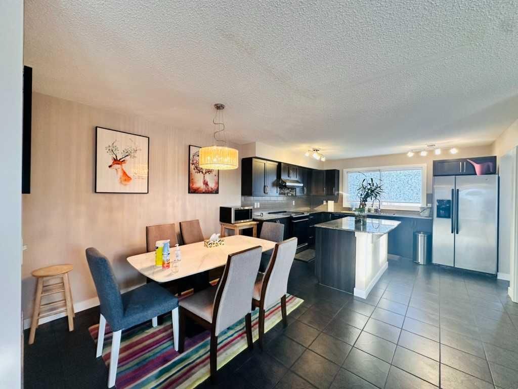 Photo of 225 panatella Square NW, Calgary, AB T3K 0V5 (MLS # A2233986)