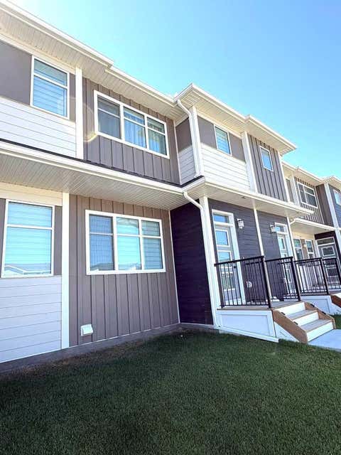 Photo of 208 Wolf Hollow Park SE, Calgary, AB T2X 6G6 (MLS # A2327115)