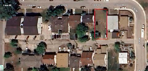 Photo of 127/129 7 Avenue SE, High River, AB T1V 1H1 (MLS # A2327500)