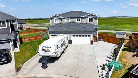 Photo of 61 Hanson Lane NE, Langdon, AB T0J 1X1 (MLS # A2323781)