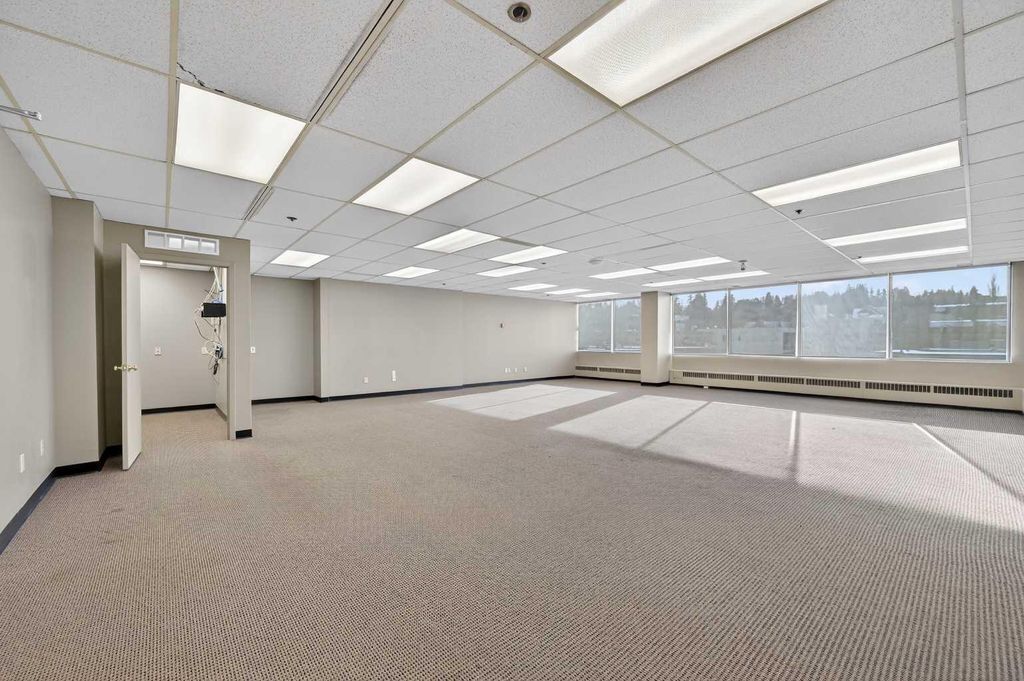 Photo of 1109 17 Avenue SW #302, Calgary, AB T2T 0B4 (MLS # A2289939)