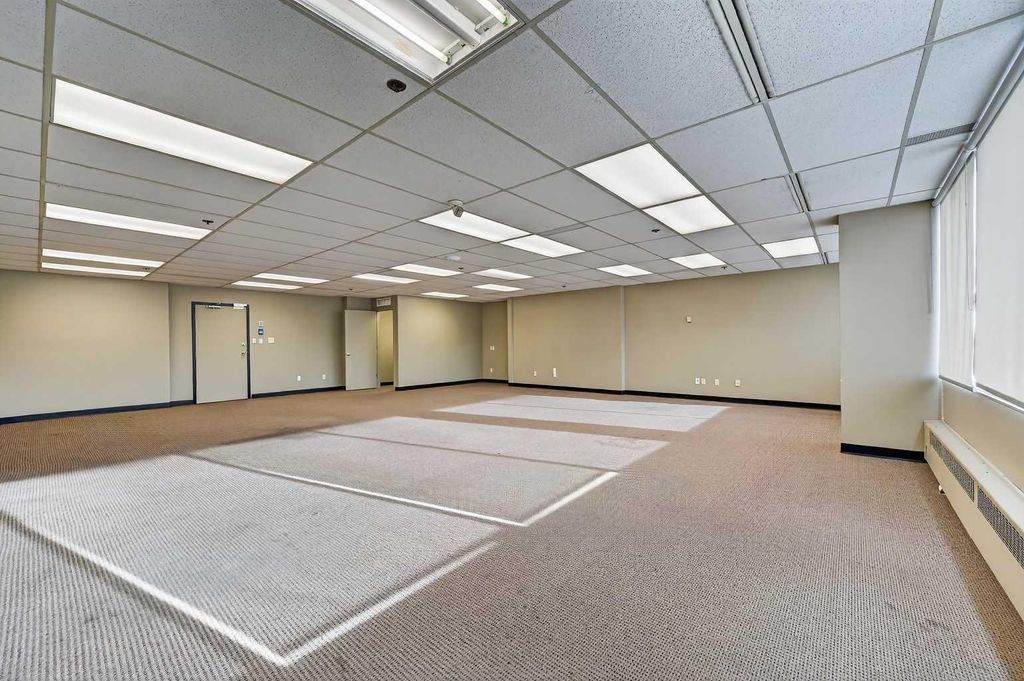 Photo of 1109 17 Avenue SW #302, Calgary, AB T2T 0B4 (MLS # A2289939)