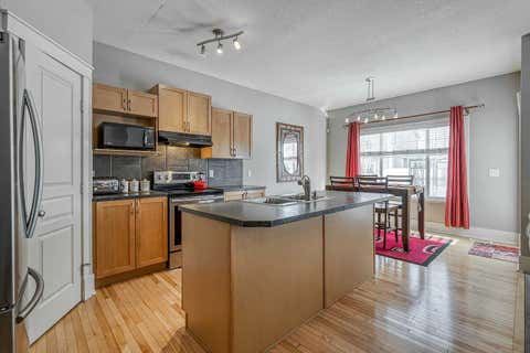 Photo of 177 Cougartown Circle SW, Calgary, AB T3H 0A3 (MLS # A2332854)