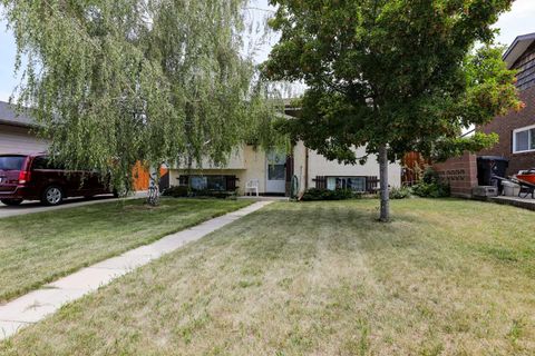 Photo of 1031 Cameron Road Rd S, Lethbridge, AB T1K 4K6 (MLS # A2331232)