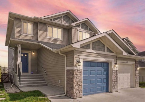 Photo of 512 Panatella Square NW, Calgary, AB T3K 0T5 (MLS # A2348470)