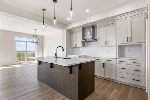 Photo of 127 Corner Glen Grove NE, Calgary, AB T3N 2S3 (MLS # A2312341)
