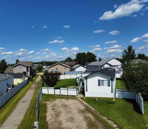 Photo of 517 9 Street, Fox Creek, AB T0H 1P0 (MLS # A2343135)