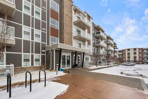 Photo of 360 Harvest Hills Common NE #107, Calgary, AB T3K 2N1 (MLS # A2305983)