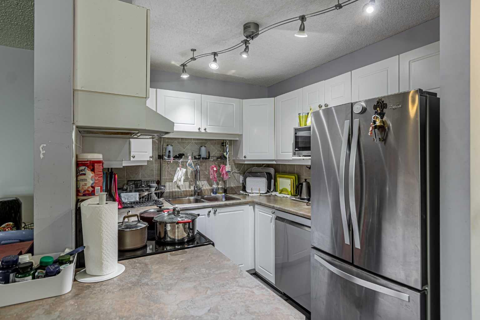 9 Country Village Bay NE 407