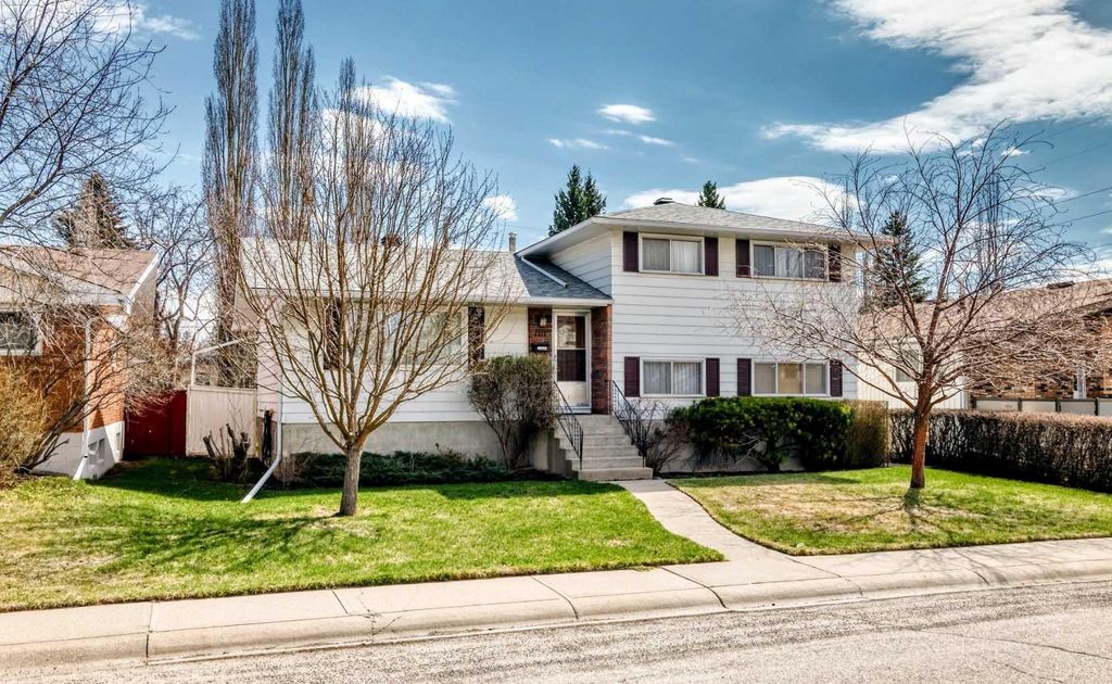 Photo of 6612 Longmoor Way SW, Calgary, AB T3E 5Z9 (MLS # A2306580)