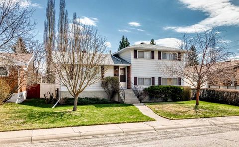 Photo of 6612 Longmoor Way SW, Calgary, AB T3E 5Z9 (MLS # A2306580)