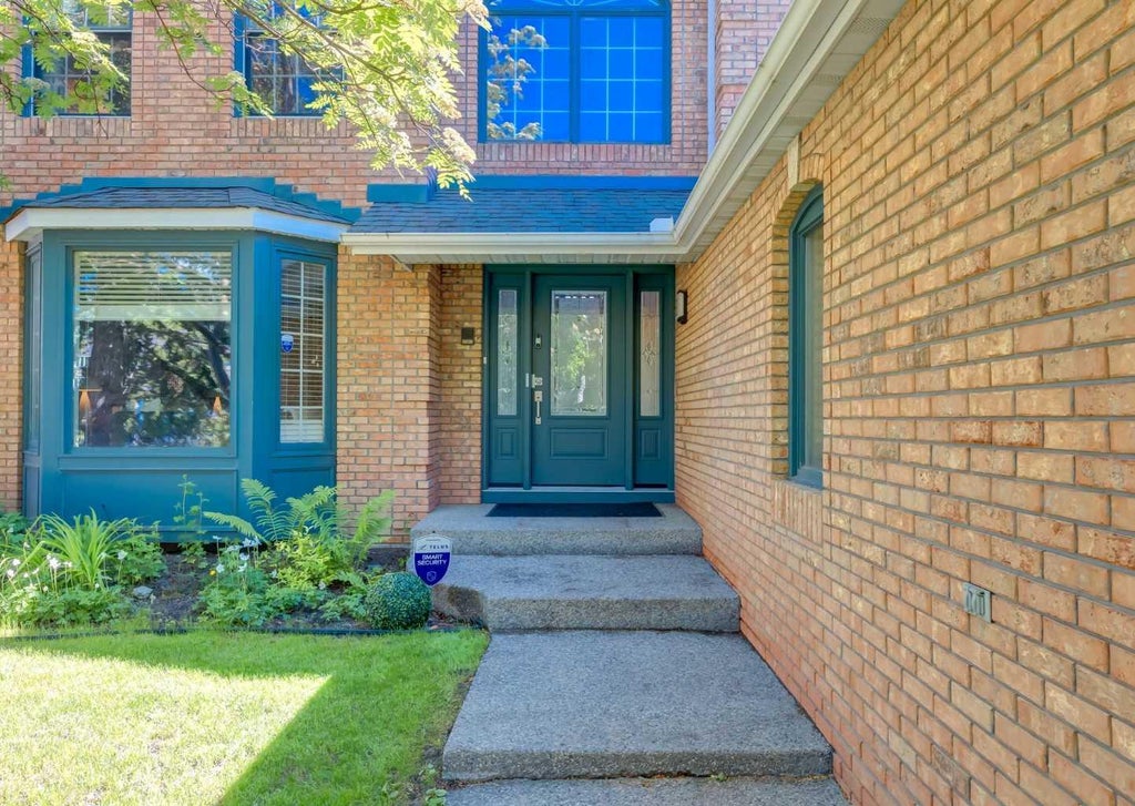 Photo of 6983 Christie Estate Boulevard SW, Calgary, AB T3H 2S5 (MLS # A2324040)