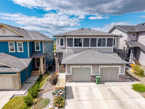 Photo of 91 Heritage Heights, Cochrane, AB T4C 2R4 (MLS # A2334139)