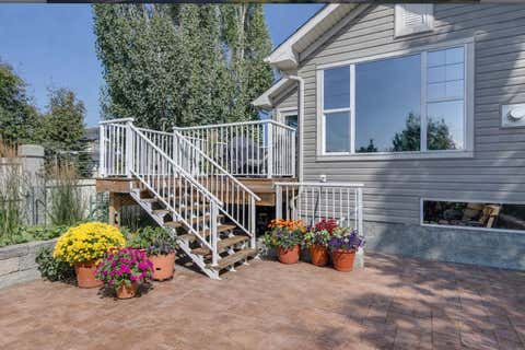 Photo of 701 Cimarron Close, Okotoks, AB T1S 1X3 (MLS # A2297473)