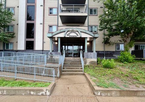 Photo of 9604 Manning Avenue #210, Fort McMurray, AB T9H 3M7 (MLS # A2327936)