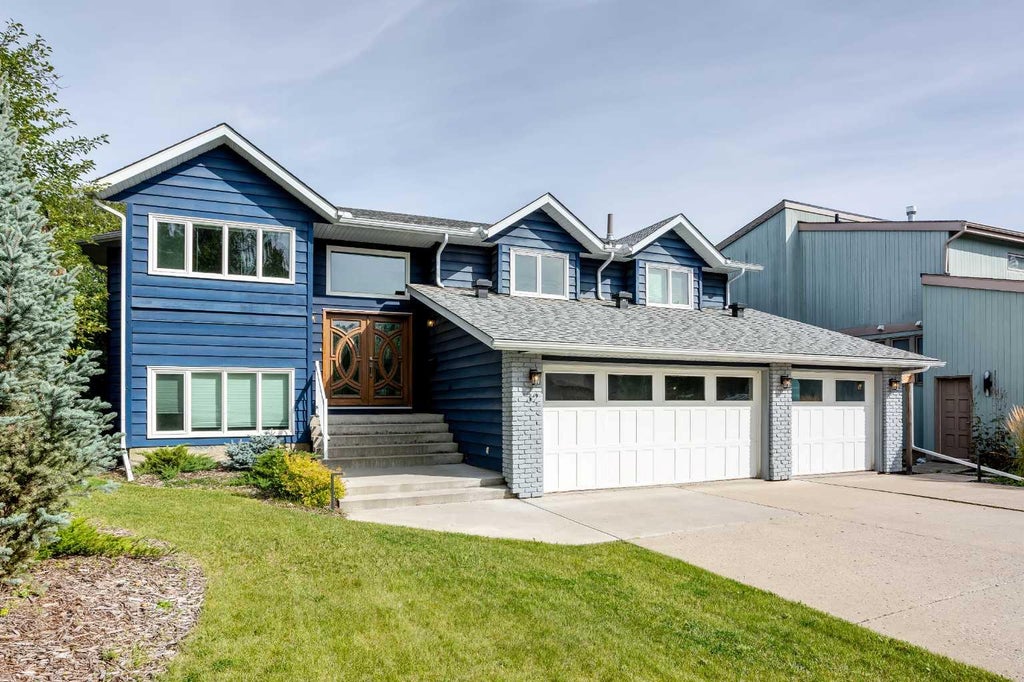 Photo of 32 Bow Village Crescent NW, Calgary, AB T3B 4X2 (MLS # A2345106)