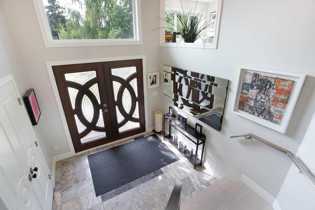 Photo of 32 Bow Village Crescent NW, Calgary, AB T3B 4X2 (MLS # A2345106)