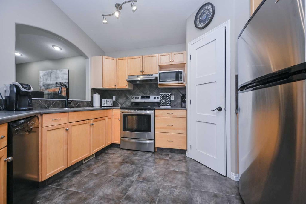 Photo of 73 Pinnacle Avenue, Grande Prairie, AB T8W 2V8 (MLS # A2321214)