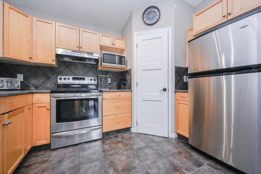 Photo of 73 Pinnacle Avenue, Grande Prairie, AB T8W 2V8 (MLS # A2321214)