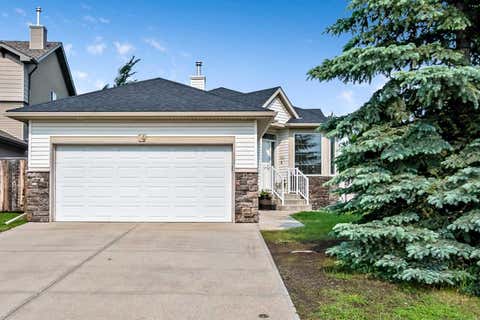 Photo of 14 Cimarron Park Cove, Okotoks, AB T1S 2L8 (MLS # A2326528)