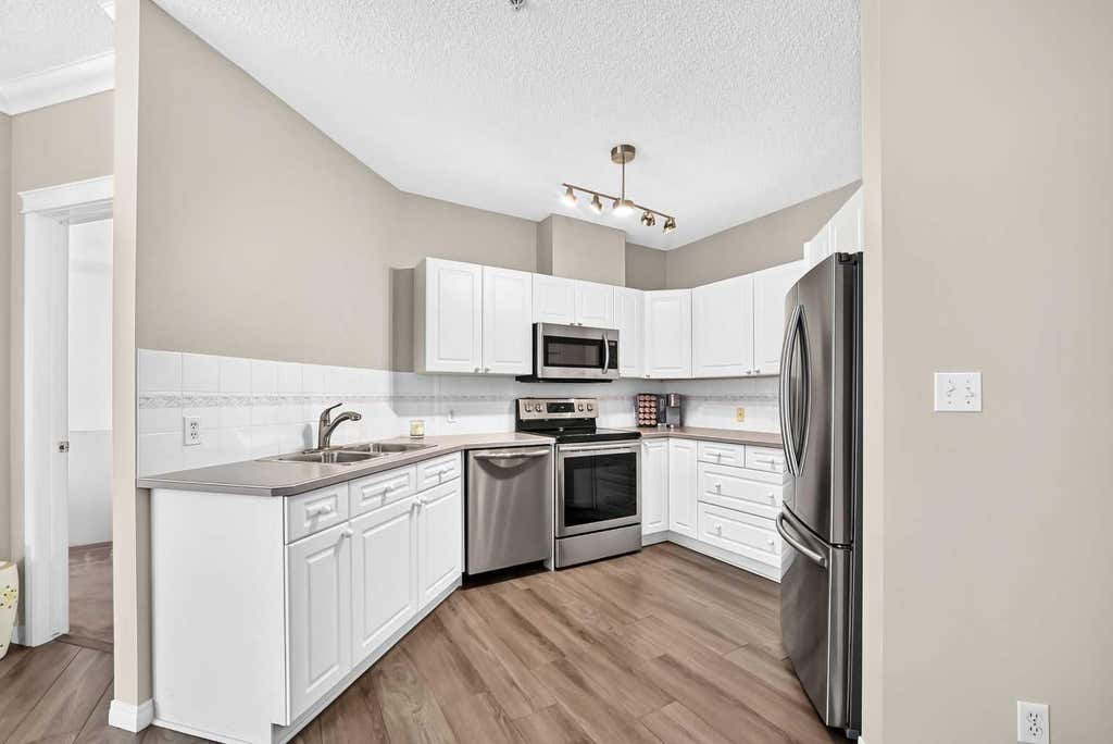 Photo of 78 Prestwick Gardens SE #210, Calgary, AB T2Z 3V2 (MLS # A2330434)
