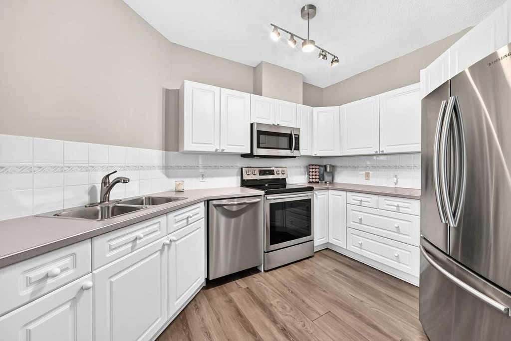 Photo of 78 Prestwick Gardens SE #210, Calgary, AB T2Z 3V2 (MLS # A2330434)
