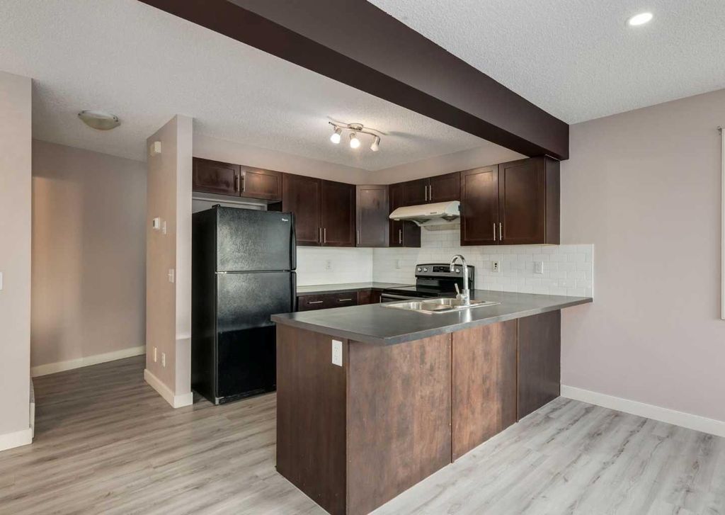 Photo of 14 Pantego Lane NW, Calgary, AB T3K 0T1 (MLS # A2299939)