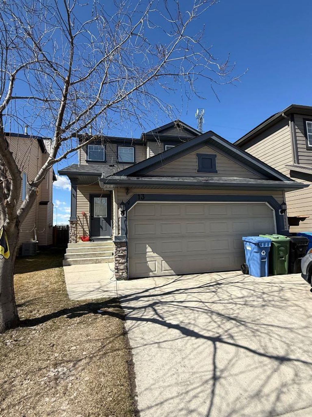 Photo of 13 Tuscany Ridge Mews NW, Calgary, AB T3L 3B7 (MLS # A2303363)