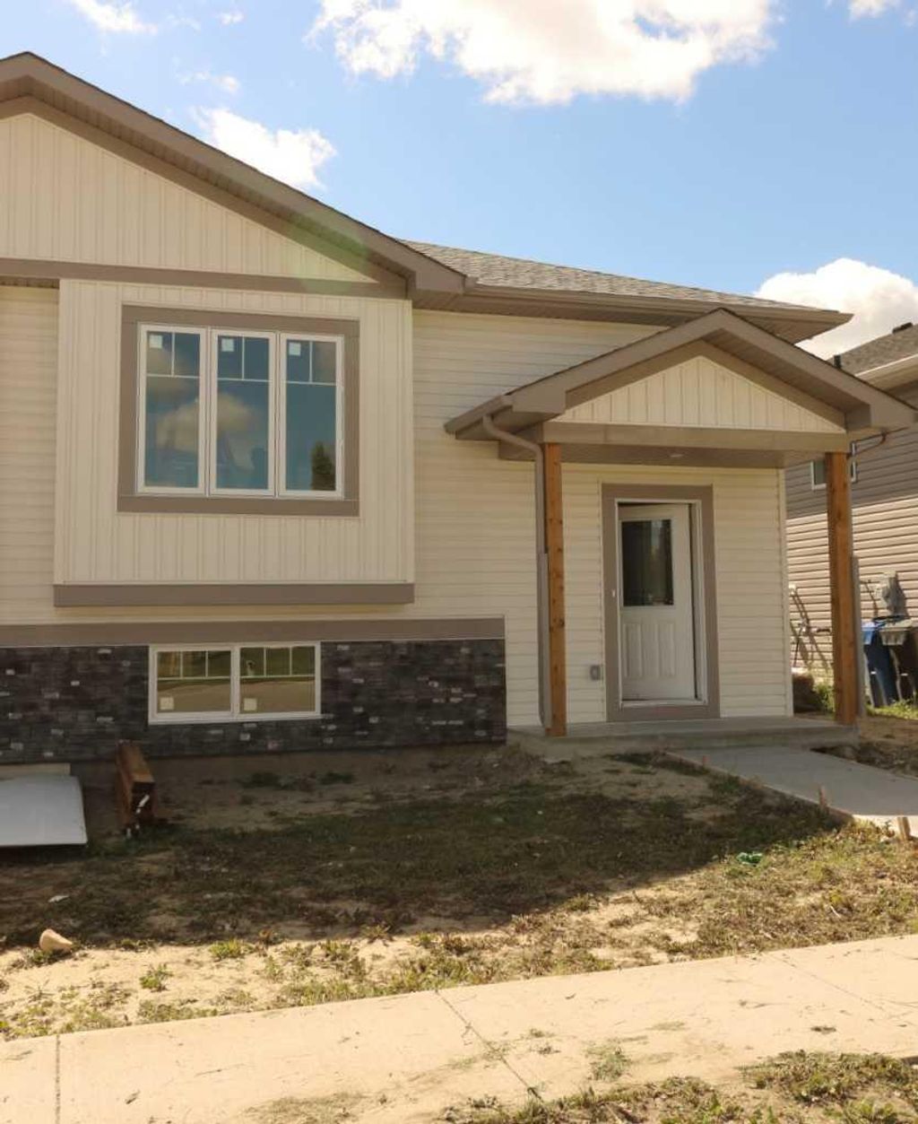 Photo of 443 Henricks Drive, Irricana, AB T0M 1G0 (MLS # A2294712)