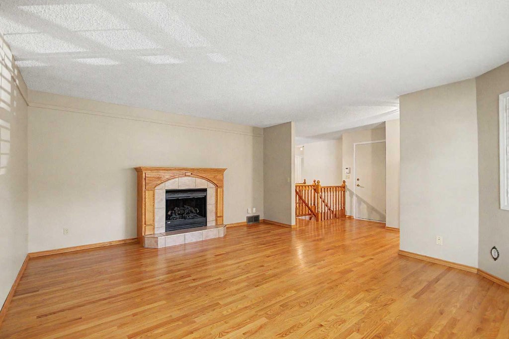 Photo of 164 Strathaven Circle SW, Calgary, AB T3H 2N5 (MLS # A2351538)