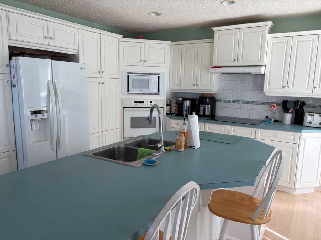 Photo of 1065 East Chestermere Drive, Chestermere, AB T1X 1A9 (MLS # A2312475)