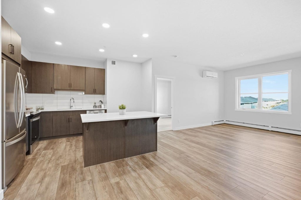 Photo of 55 Wolf Hollow Crescent SE #301, Calgary, AB T2X 5K9 (MLS # A2346652)