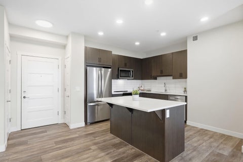 Photo of 55 Wolf Hollow Crescent SE #301, Calgary, AB T2X 5K9 (MLS # A2346652)