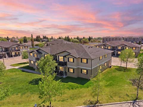 Photo of 8 Bayside Place #400, Strathmore, AB T1P 0E1 (MLS # A2314352)