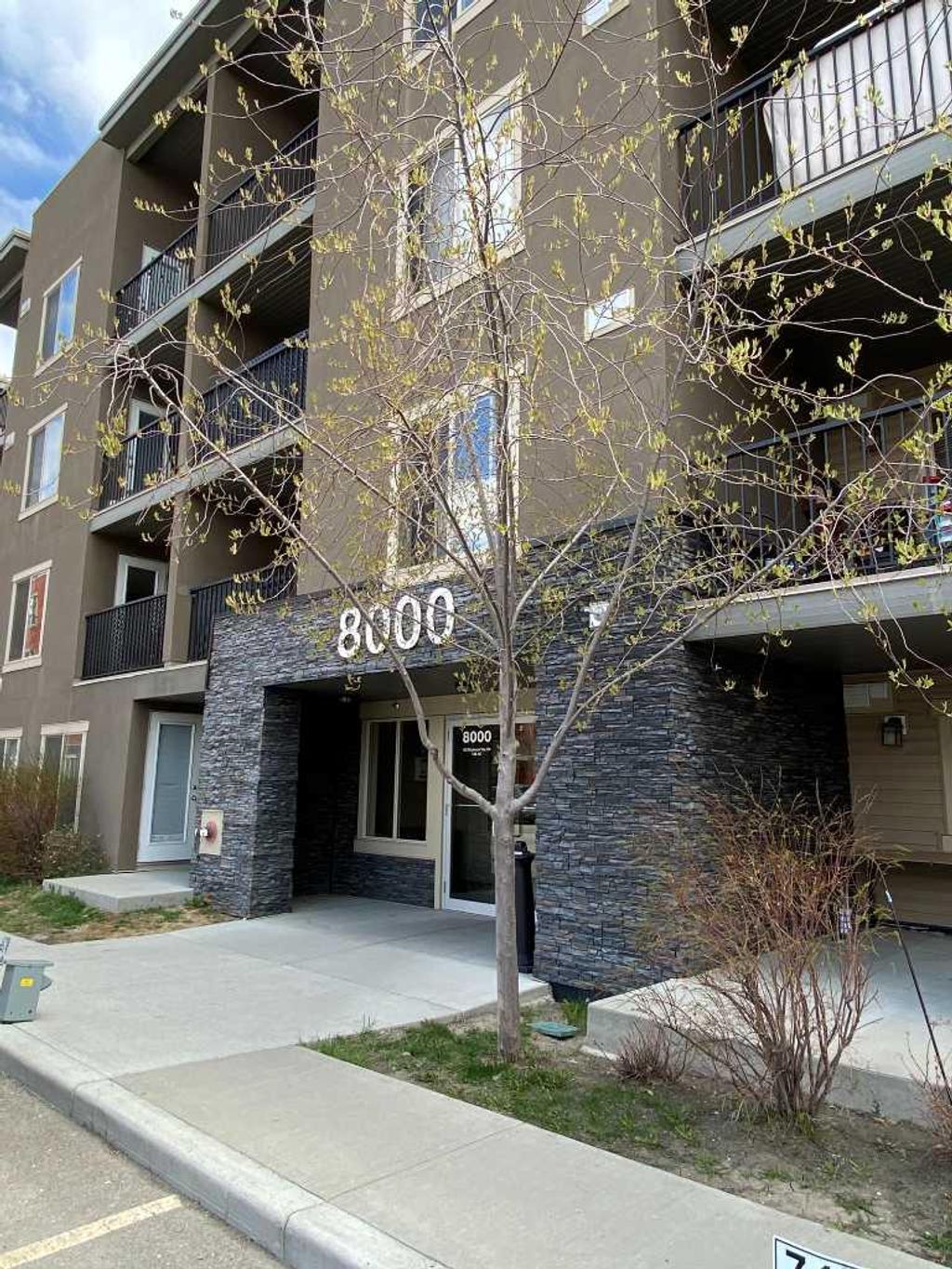 Photo of 403 Mackenzie Way SW #8104, Airdrie, AB T4B 3V7 (MLS # A2309384)