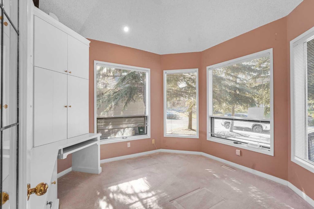 Photo of 84 Strathlorne Crescent SW, Calgary, AB T3H 1M8 (MLS # A2353985)