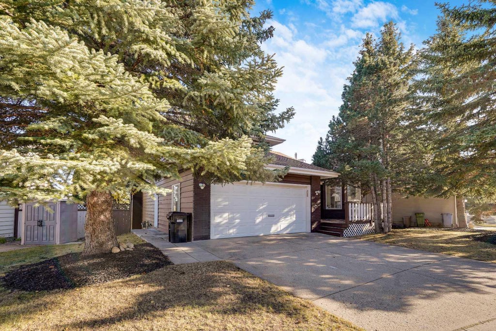 Photo of 84 Strathlorne Crescent SW, Calgary, AB T3H 1M8 (MLS # A2353985)