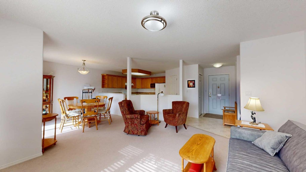 Photo of 5402 50 Avenue #303, Stettler, AB T4K 1K9 (MLS # A2348130)