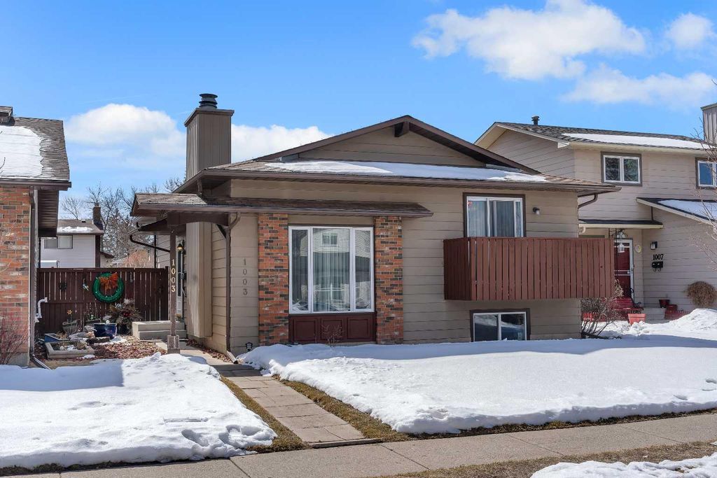 Photo of 1003 Berkley Drive NW, Calgary, AB T3K 1E3 (MLS # A2301092)