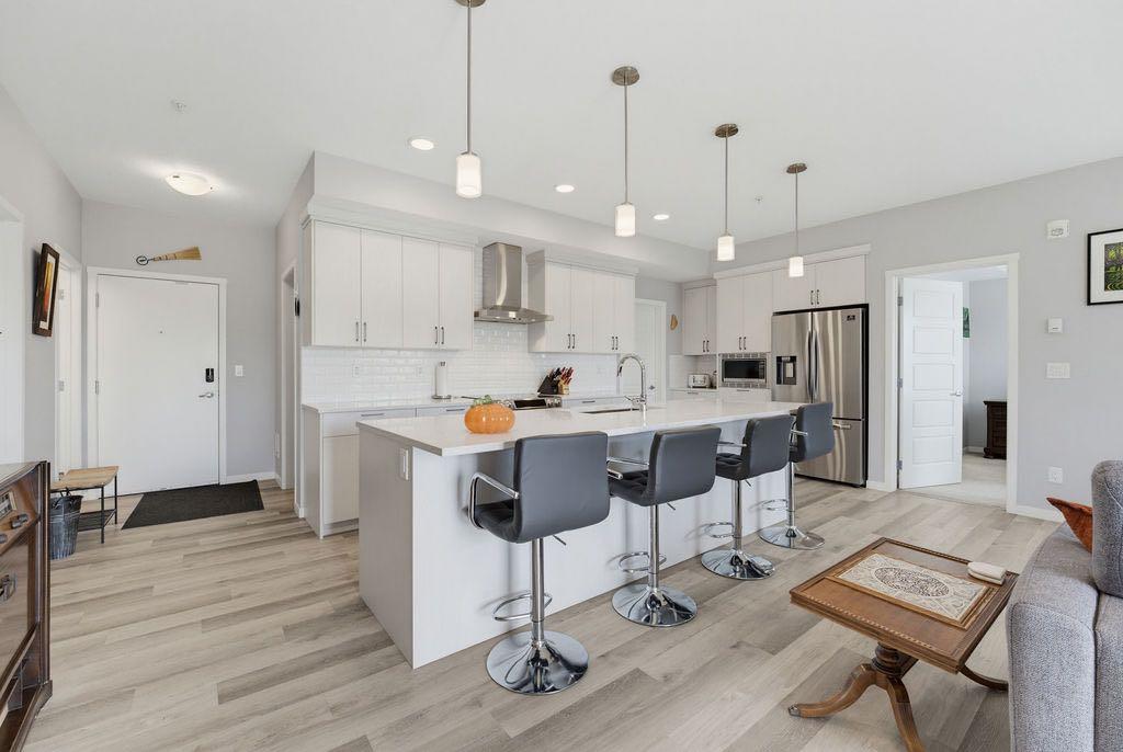 Photo of 300 Harvest Hills Place NE #204, Calgary, AB T3K 2P4 (MLS # A2350621)