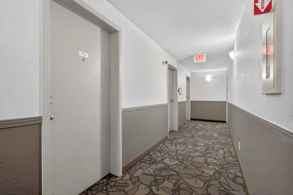 Photo of 304 Mackenzie Way SW #7103, Airdrie, AB T4B 3H7 (MLS # A2310904)