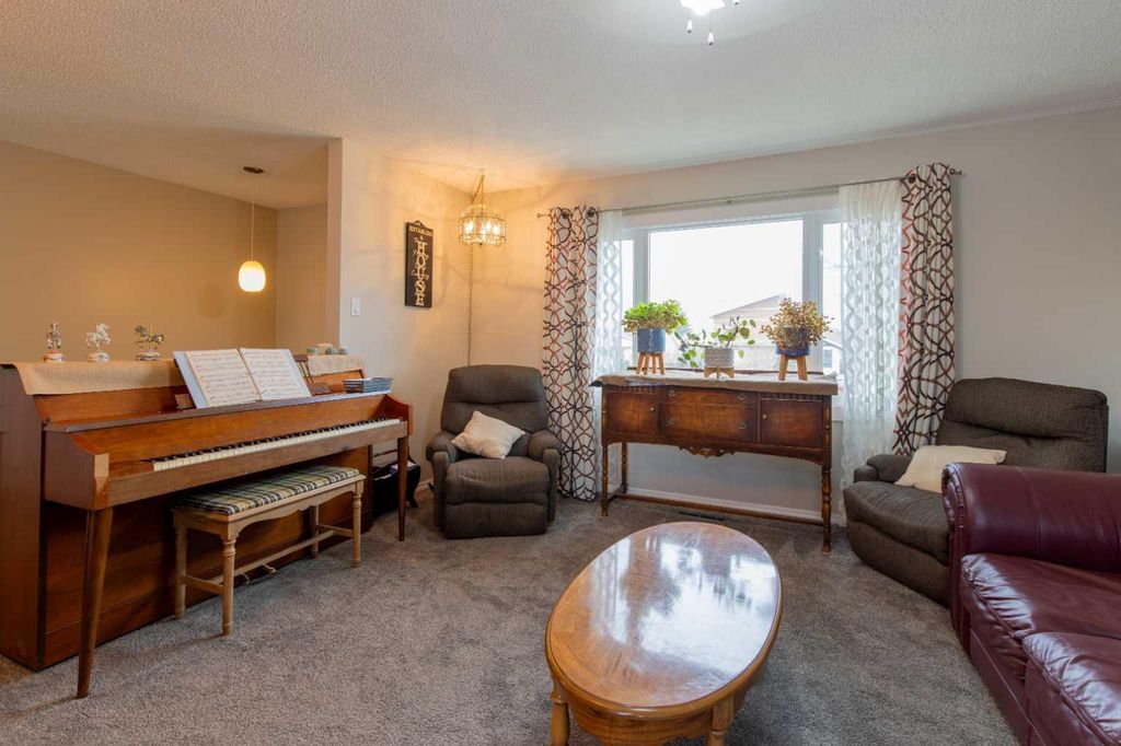 Photo of 384 N 100 E, Raymond, AB T0K 2S0 (MLS # A2286794)