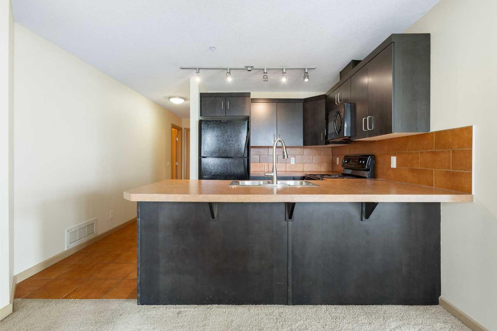 Photo of 1410 1 Street SE #610, Calgary, AB T2G 5T7 (MLS # A2307791)