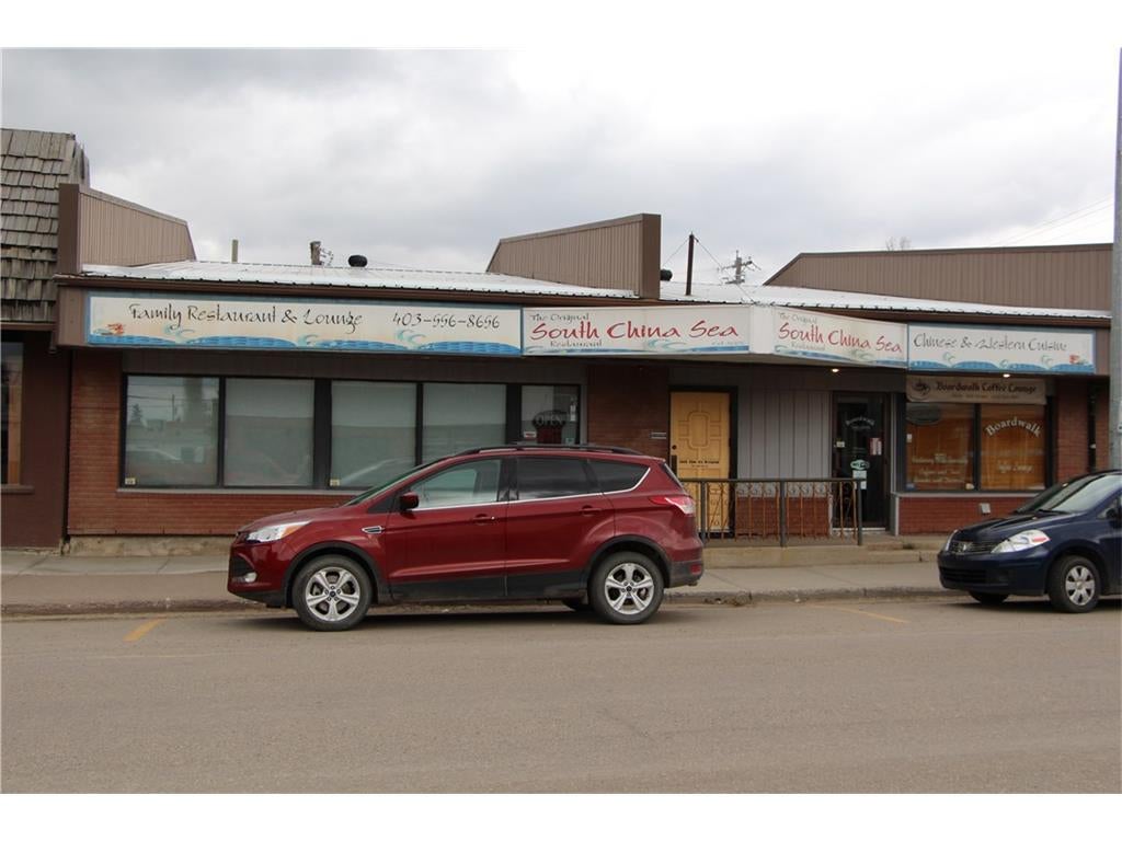 Photo of 5018 50 Street, Olds, AB T4H 1S4 (MLS # A2350250)