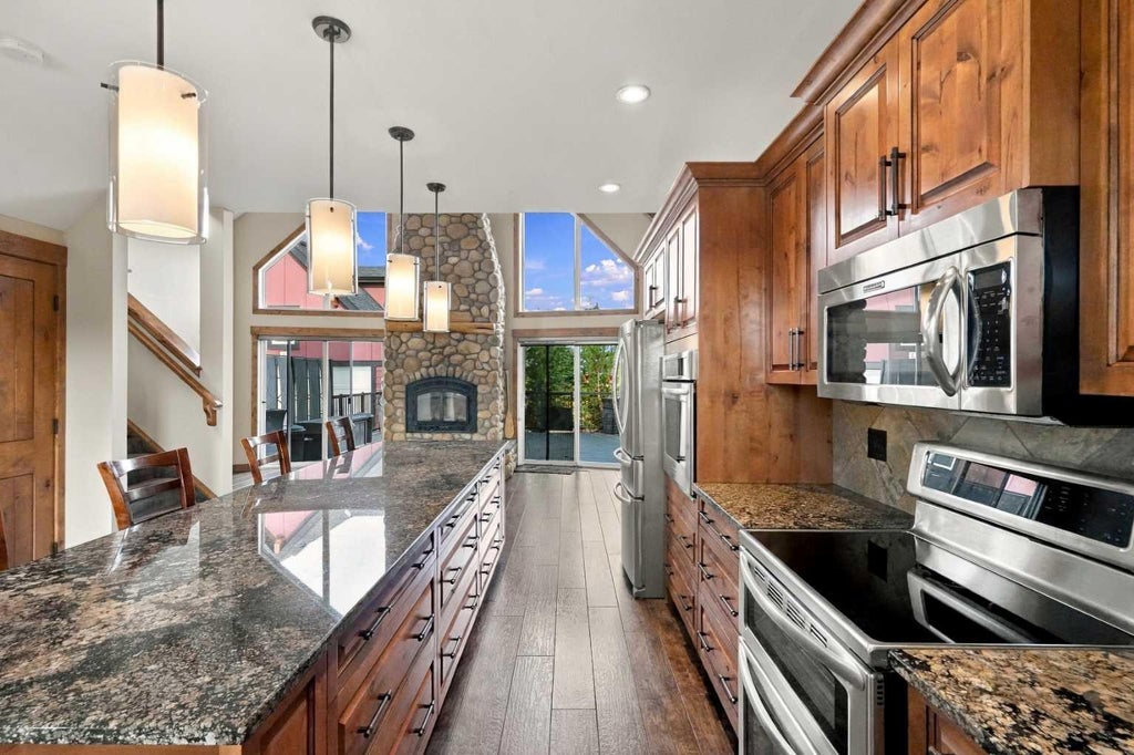 Photo of 210 Cottageclub Crescent, Rural Rocky View County, AB T4C 1B1 (MLS # A2351102)