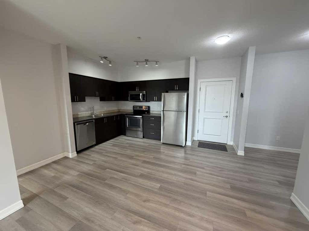Photo of 117 Copperpond Common SE #219, Calgary, AB T2Z 5E2 (MLS # A2339038)